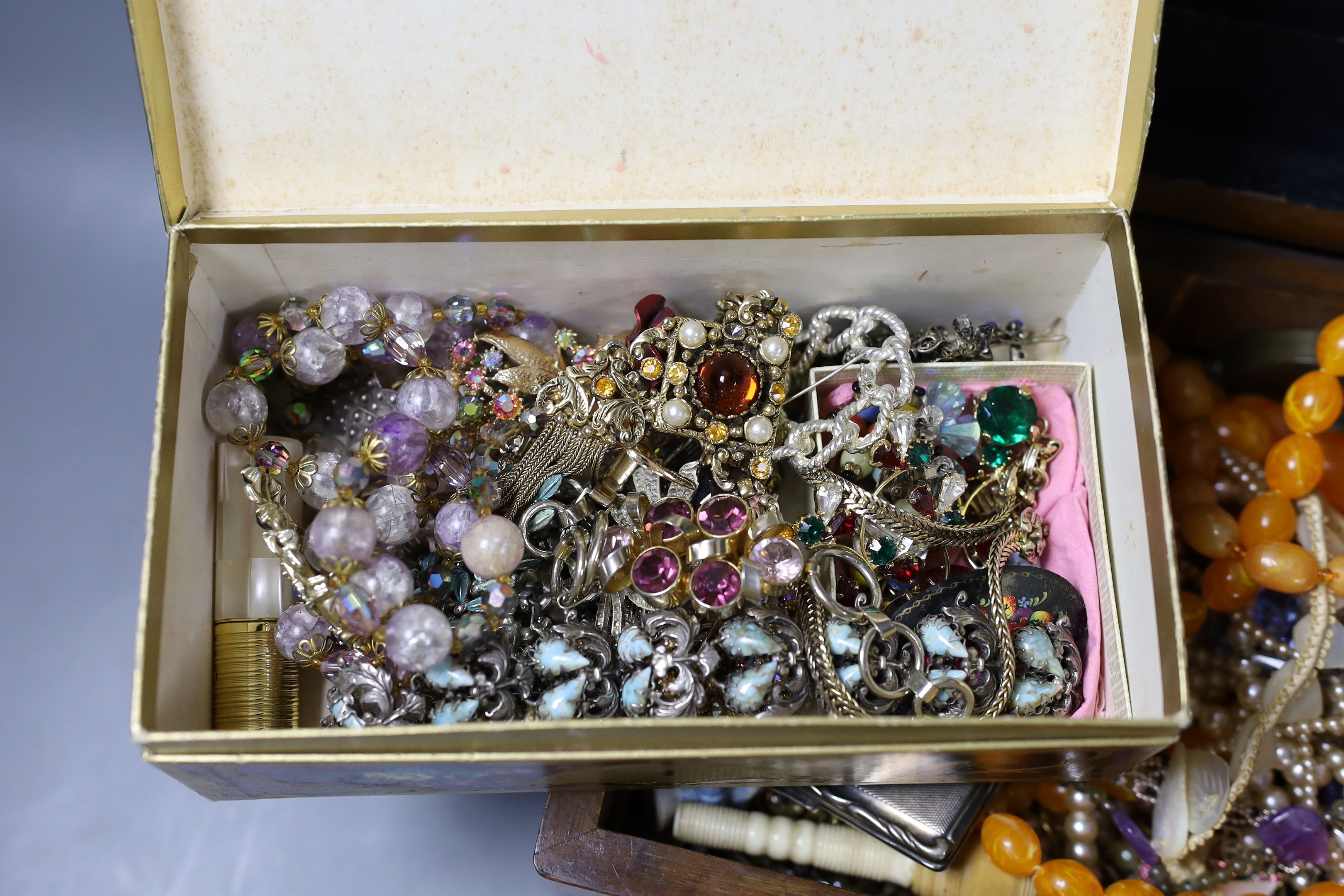 A large quantity of mixed costume jewellery in two boxes.